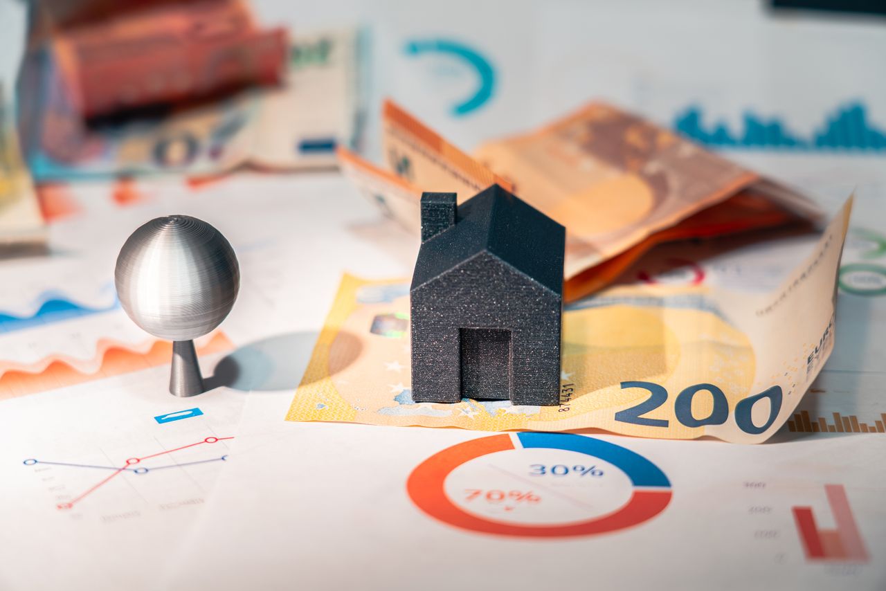 The Art of Drawing Readers In: Your attractive post title goes here Conceptual image of real estate and finance involving euro currency and data charts, symbolizing investment.